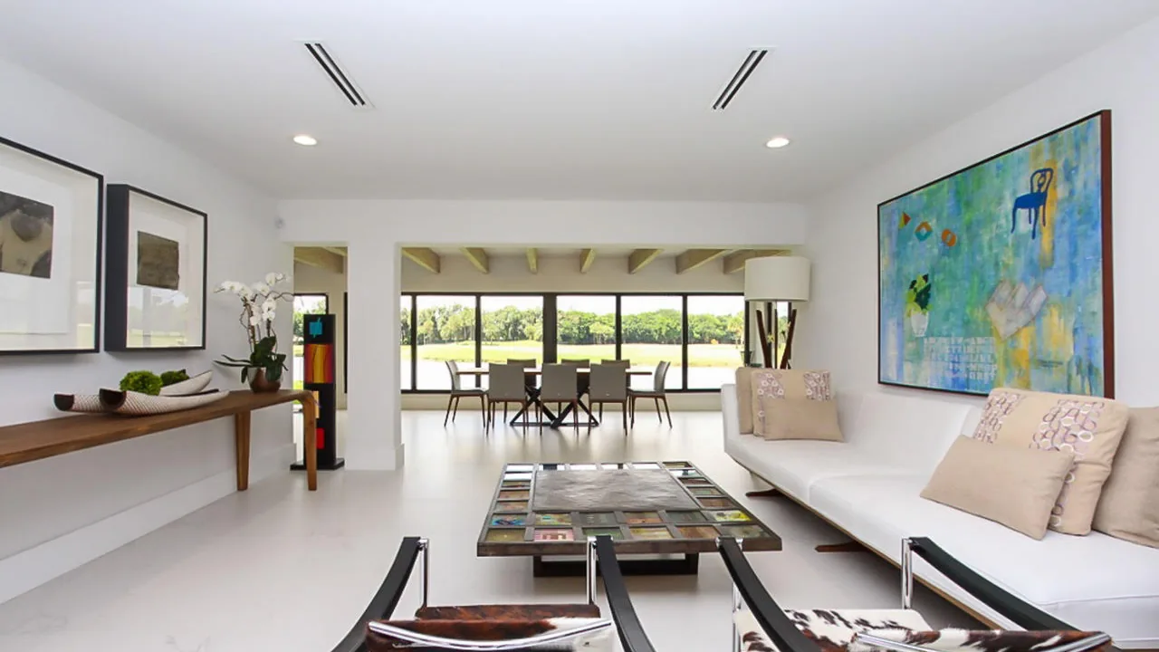 White living room with garden view, Opening Up a Dated Floor Plan Toward the View